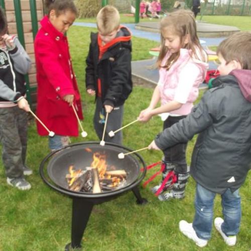 Camp fire fun! Mmm...toasted marshmallows!!.jpg